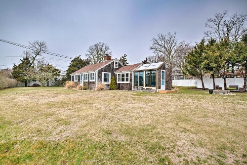Waterfront Cape Cod Home with Sunroom and Fire Pit image 4
