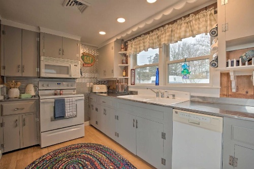 Waterfront Cape Cod Home with Sunroom and Fire Pit image 5